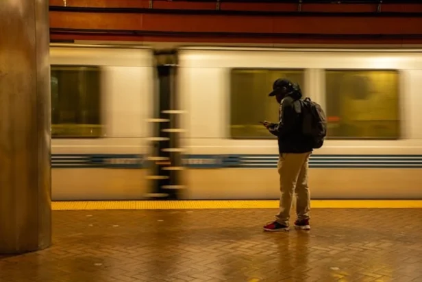 BART train at station platform in Bay Area transit system crisis context