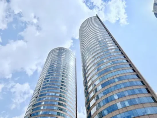 Oracle headquarters Redwood City office towers technology company layoffs