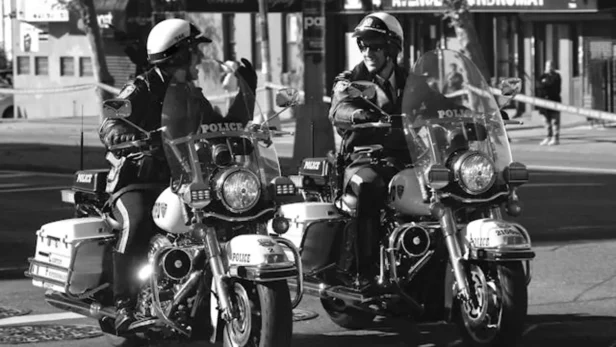 Police officers prepare to conduct a DUI checkpoint in San Francisco to screen drivers for impaired driving violations.