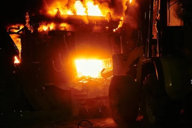 Police chase suspect's vehicle burns at Travis Air Force Base entrance gates following high-speed pursuit from Napa County.