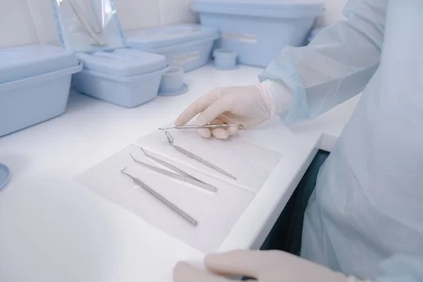 Healthcare workers discuss budget cuts affecting dental coverage for low-income patients in California.