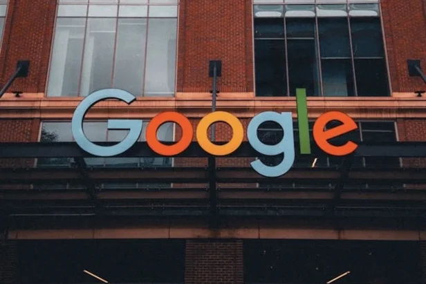 Construction workers and equipment at the site of Google's new San Jose campus development project.
