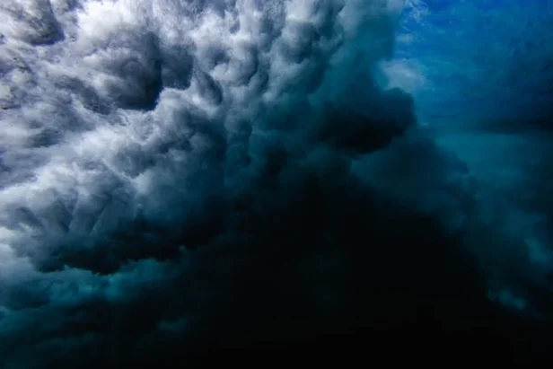 Scientists monitor weather patterns as a powerful El Niño system moves toward California's coast, potentially bringing heavy