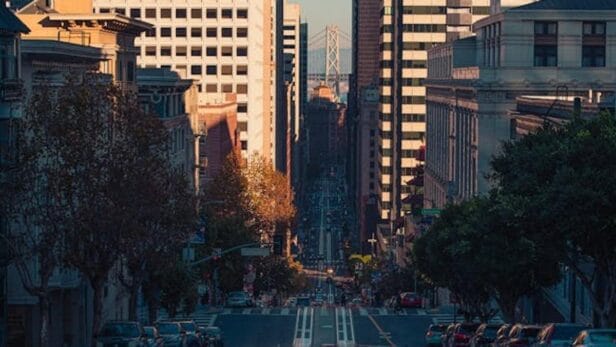 The Golden Gate Bridge frames the setting sun perfectly between its towers during the rare "California Henge" phenomenon in S