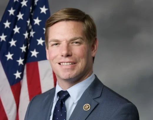Rep. Eric Swalwell speaks to reporters at the Capitol as political controversies roil California's gubernatorial race.